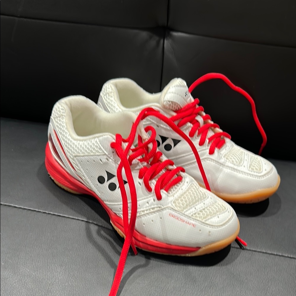 White and Red Athletic Shoes